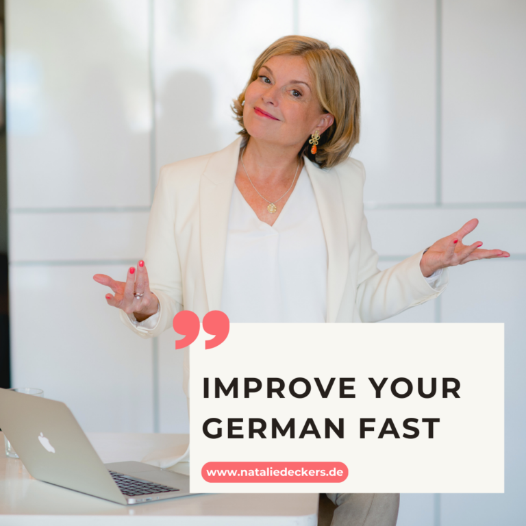 Natalie Deckers sitting on her desk, title: improve your German fast